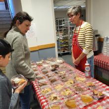 Friends serving pie